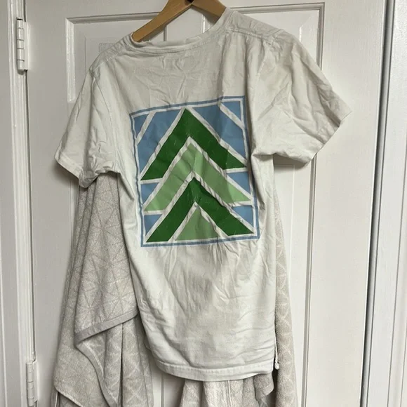 The brand is Russell and the size is small and is white with green and blue. - Picture 2 of 6